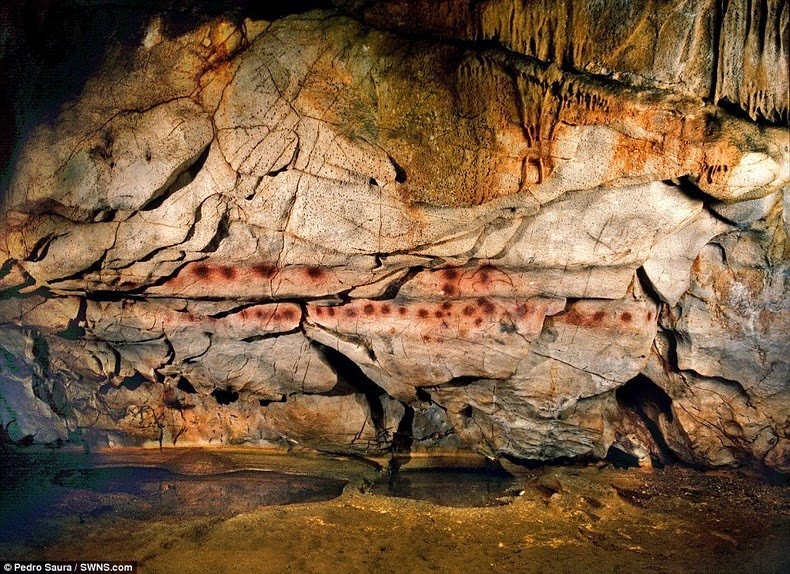 The Oldest Cave Paintings in The Cave of El Castillo.